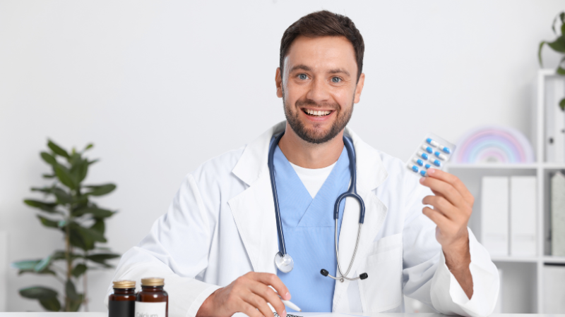 Professional using Optuvit eye supplements to reduce digital eye strain and floaters at work.